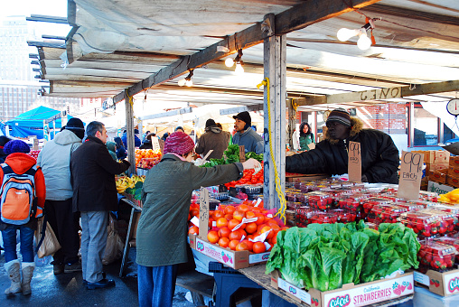 Boston, MA, USA February 5 Shoppers seek fresh fruit on a winter\
