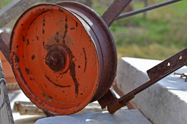 istock Red old iron wheel from agricultural machinery 1316286583