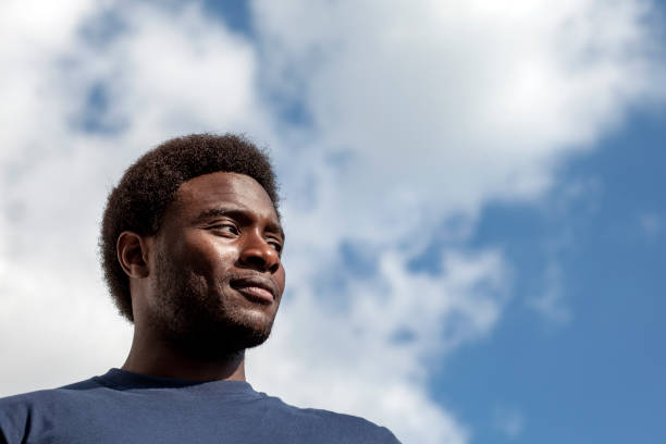 istock Arab man's portrait towards the cloudy sky 1316287432