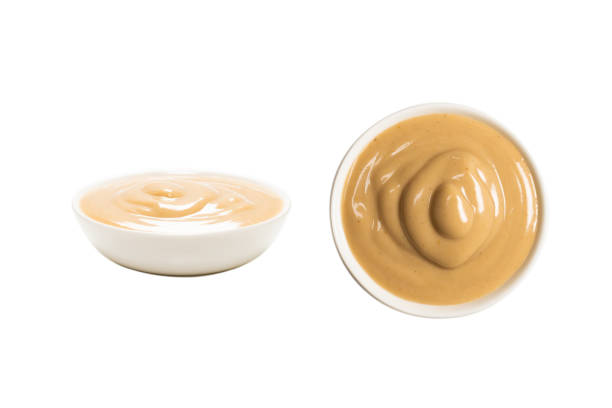 istock Mushroom sauce in a bowl isolated on white background. 1316288384