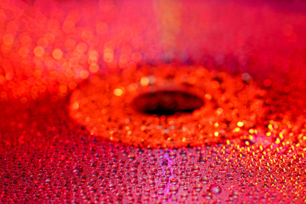 This is rain with splashing water droplets photographed in spring in Germany