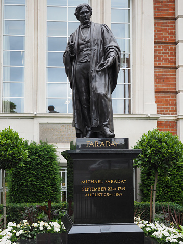 London, United Kingdom - Circa June 2017: Statue of Michael Faraday in Savoy Place by the Irish sculptor John Henry Foley, circa 1874