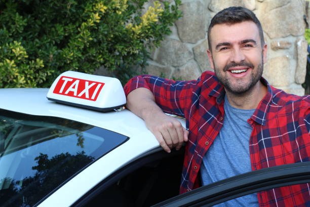 istock Young taxi driver at work 1316297379
