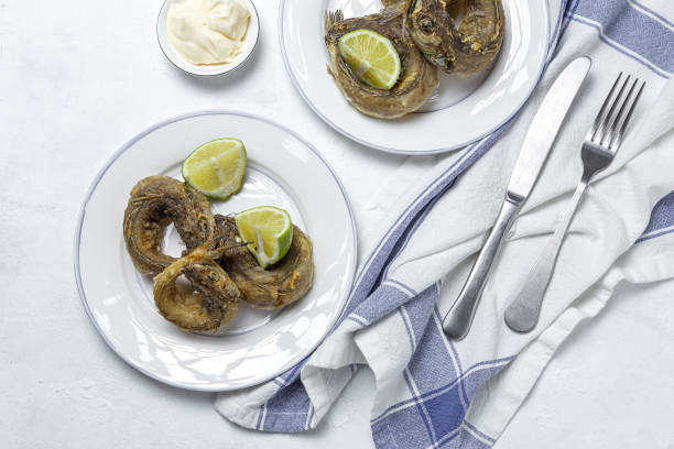 istock Typical Spanish frying of fried fish with lemon 1316299442