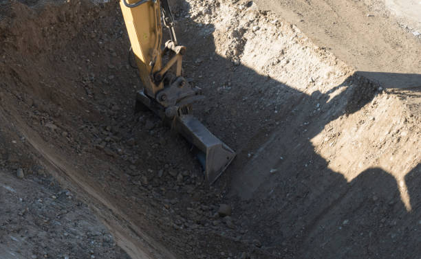 istock earthworks with excavator on construction site 1316299867