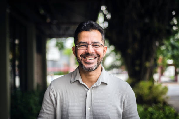 Smiling man outdoors in the city