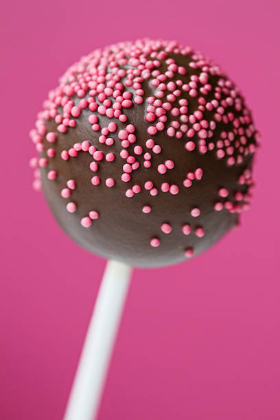 istock Upload image of a chocolate cake pop with pink sprinkles 131630427