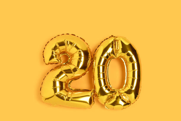 istock Number 20 golden balloons with copy space. 1316306186