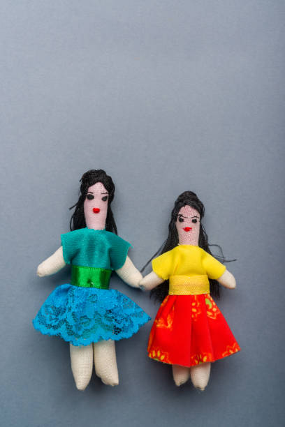 Two handicrafts and souvenirs from northeastern Brazil on neutral gray background