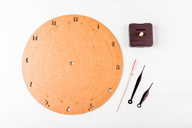 DIY and kid's creativity. Step by step instruction: how to wall clock. Step1 preparation tools: round wood panel, clock hands. Children Craft workshop