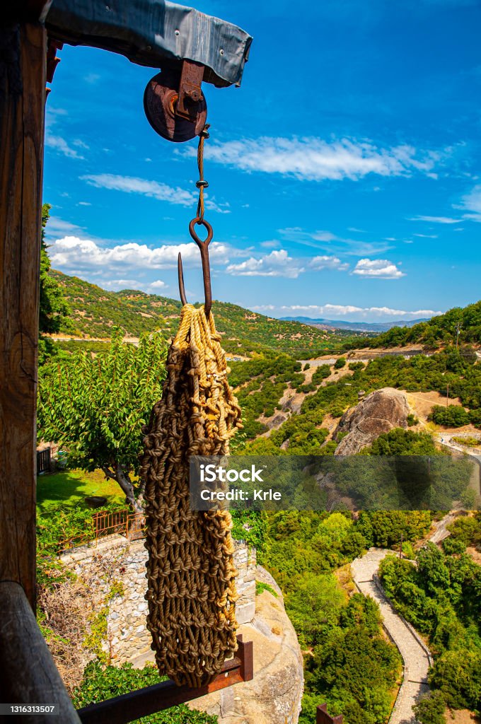 View of Monastery of the Holy Trinity om rock in Meteora, Greece View of Monastery of the Holy Trinity om rock in Meteora, Greece. The Meteora area is on UNESCO World Heritage List since 1988 Architecture Stock Photo