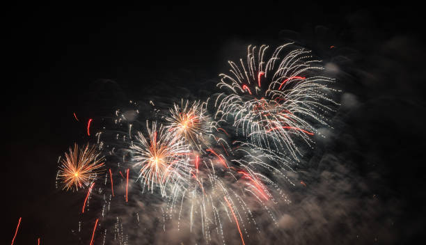 istock Fireworks light up the sky with smoke. Colorful. 1316329938