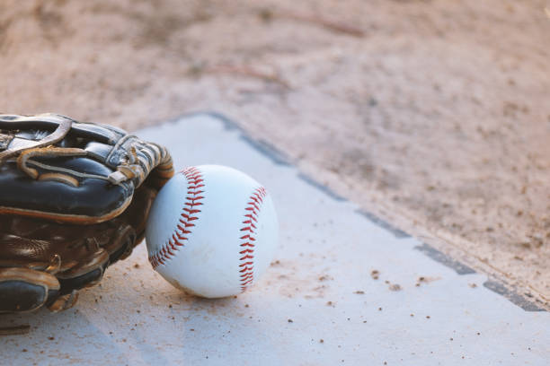istock Baseball equipment on ball field 1316338442