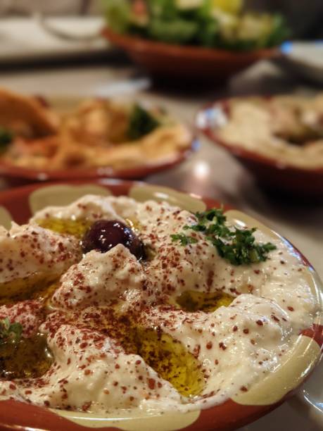 istock Chick pea hummus with olive oil and chilli flakes 1316341812