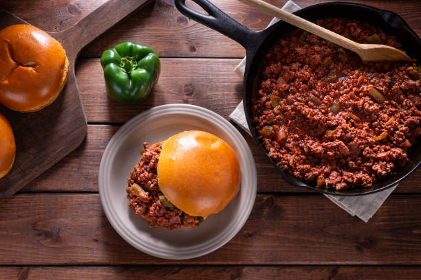 Sloppy Joe Sandwich Homemade Sloppy Joe Sandwich on a Brioche Bun. sloppy joes stock pictures, royalty-free photos & images