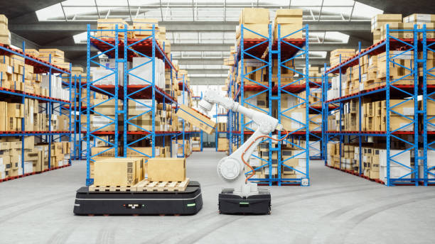 automated robot carriers and robotic arm in modern distribution warehouse - driverless train imagens e fotografias de stock