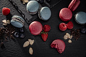 Almond Macaron Blueberry and Strawberry cookies sweet pastry with berries stock photo