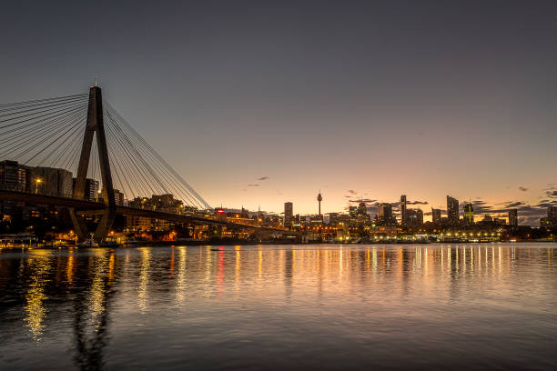 istock dawn, sydney Harbor and cityscape 1316359564