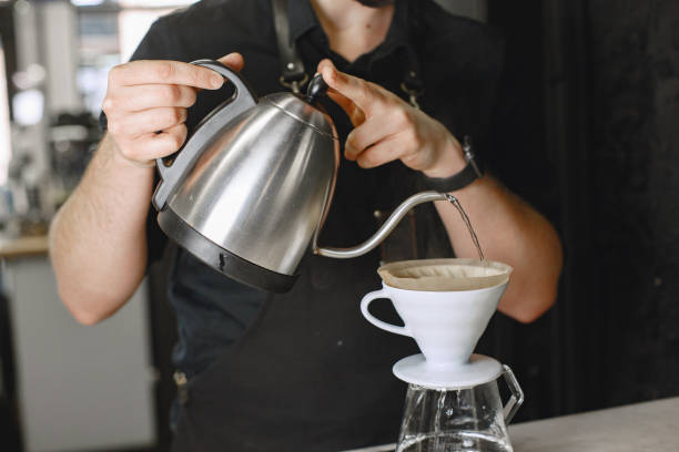 istock Ground black coffee is brewed in a kemex 1316365652