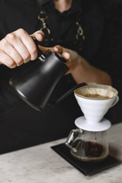 istock Ground black coffee is brewed in a kemex 1316365717
