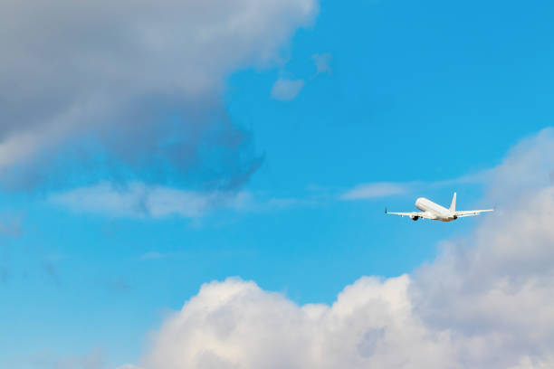 istock An airplane taking off toward the blue sky 1316366410