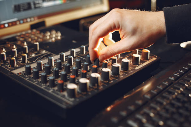istock Man working in a studio with a sound recording equipment 1316366676