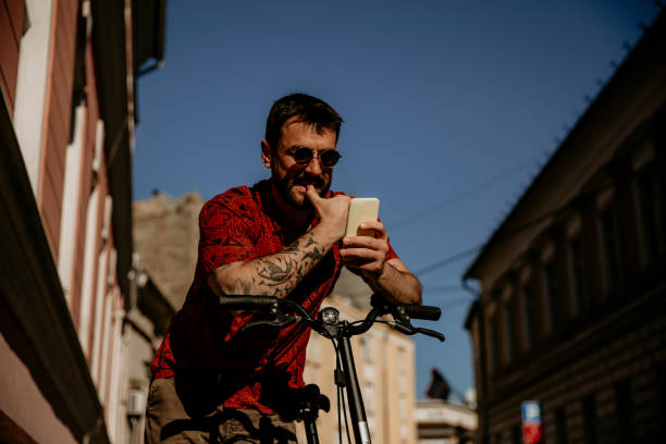 istock Man thinking what to text on the phone 1316374768