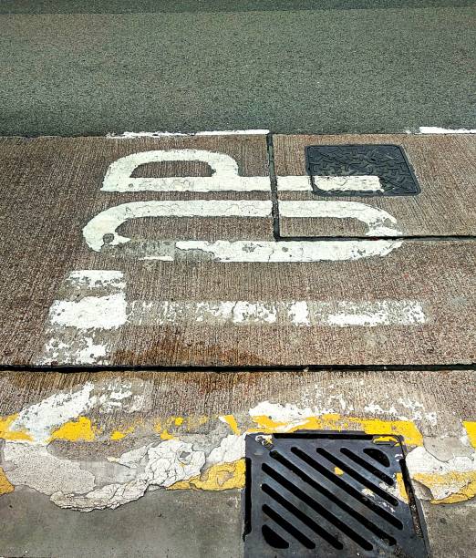 istock STOP painted on a street. 1316389982