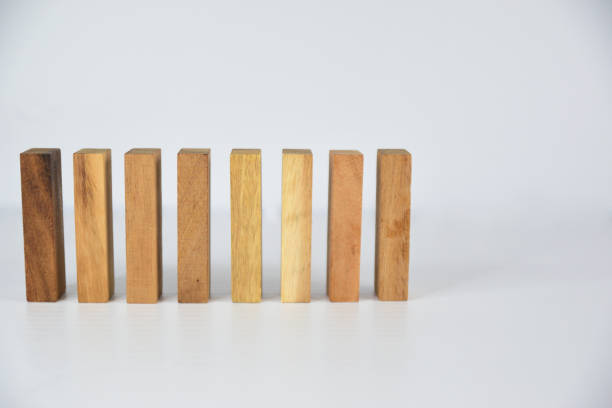 istock Set of wooden blocks lined up vertically in a row 1316393404