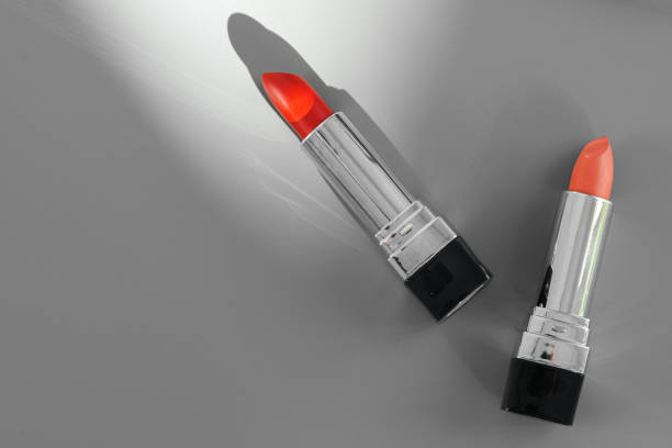 istock Pink and red lipsticks on vanity table 1316395353