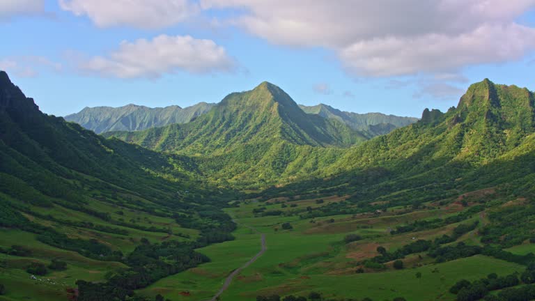 AERIAL Through the Ka'a'wa Valley on Oahu Island towards the Pu'u Ohulehule