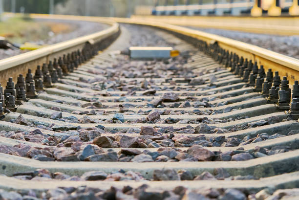 istock railroad rails on concrete sleepers. updated railway for high-speed, express train railway 1316396667