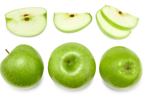 istock green apple with slices isolated on a white background. top view. clipping path 1316397398