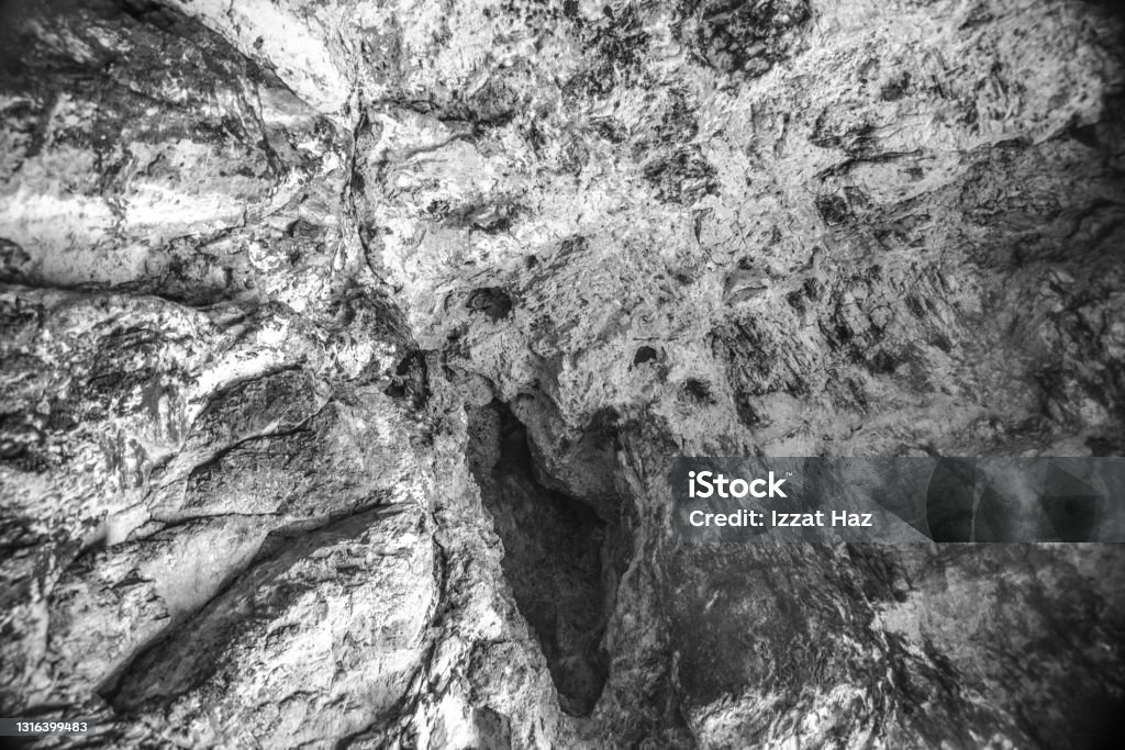The surface of ceiling cave in black & white photo Cave Stock Photo