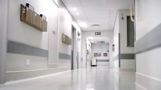 istock Shot of an empty hospital hallway 1316402250