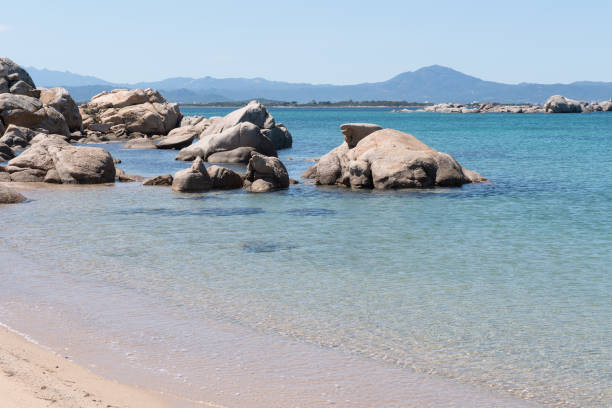 istock rocks and blue sea 1316402280