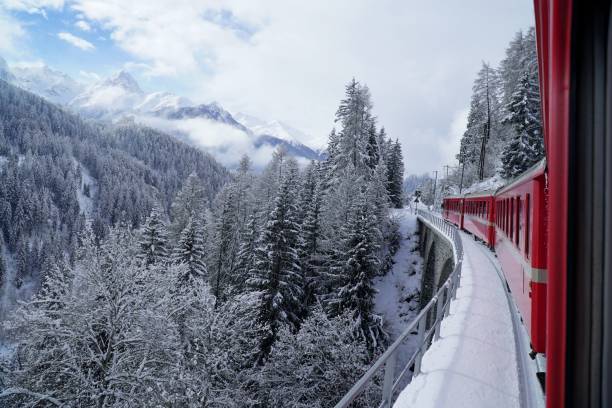 zug von tarasp - locomotive steam train train snow stock-fotos und bilder