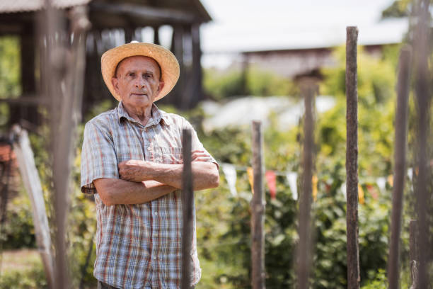 istock Senior man standing at his garden 1316405440