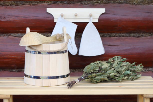 different accessories for sauna and bath treatments. - wooden hub imagens e fotografias de stock