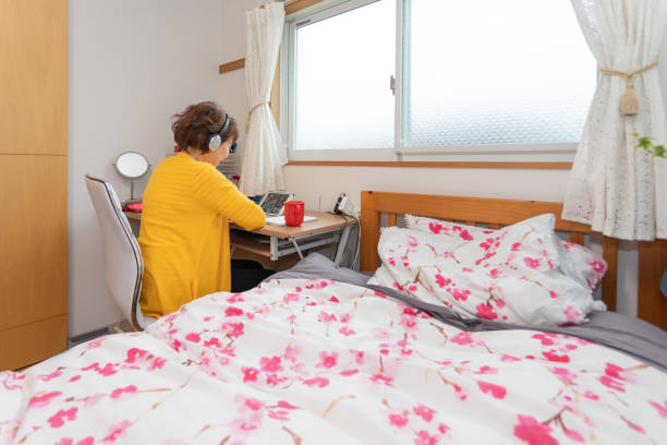 istock Senior woman having online meeting 1316407106