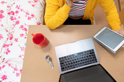 Senior woman having online meeting