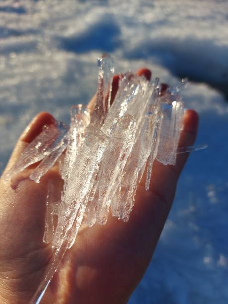 istock Ice in hand transparent Icicle 1316411144