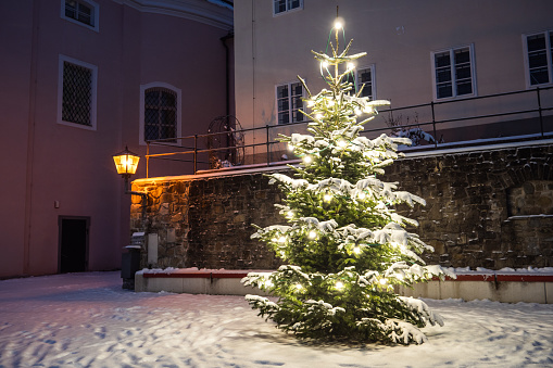 Christmas Tree Outside in the Snow Illuminated on a Cold Winter Night at  Sonntagberg Basilica Church, Mostviertel, Lower Austria, an X-Mas Concept