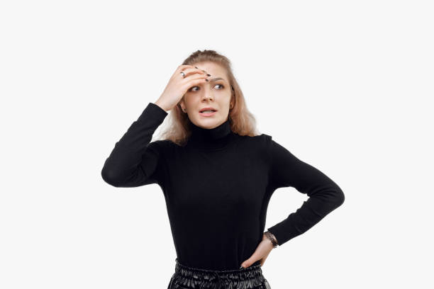 istock Nervous young woman making mistake, look upset, touch head, forgot or remember, being guilty, feeling awkward 1316412799