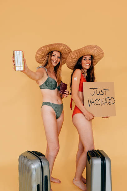 istock vaccinated women ready to travel 1316414155