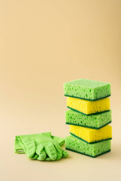 istock Stack of dishwashing sponges and rubber gloves 1316414186