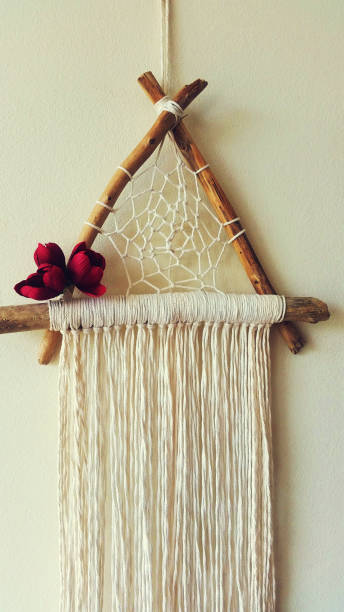 istock Macrame wall hanger with pink roses photo 1316414548