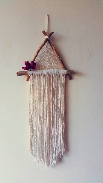 istock Macrame wall hanger with pink roses photo 1316414573