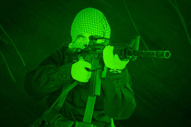 east islamic rebel with assault rifle. view through night vision. - jihad imagens e fotografias de stock