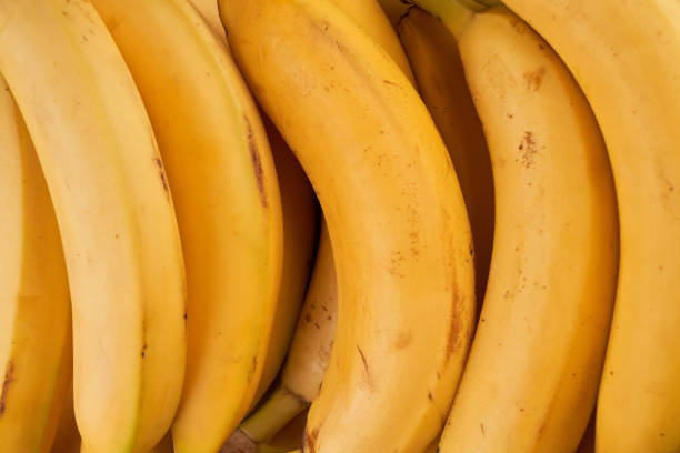 istock Yellow whole bananas close up background 1316416644